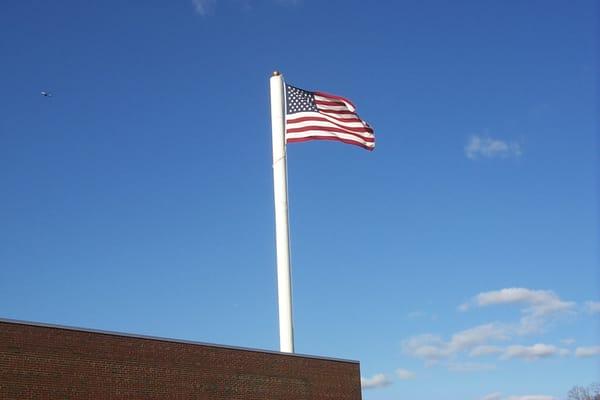 The American Flag waves high over Economy