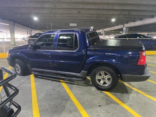 This is my truck with a flat at Atlanta domestic airport in the parking garage.