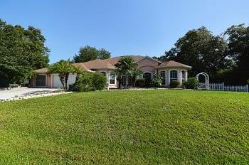 Beautiful Port Charlotte home available for viewing.  4 bedrooms on a 1 acre private city lot.