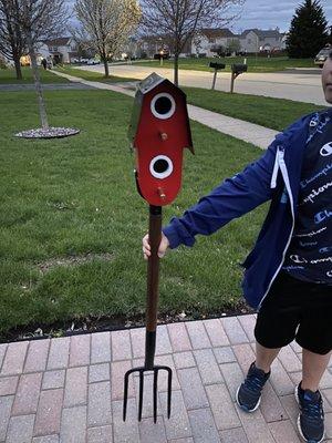 Two level bird house on a pitch fork!