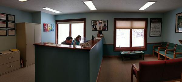 Edinboro Family Chiropractic reception area and check-in with Andrew and Liz hard at work!