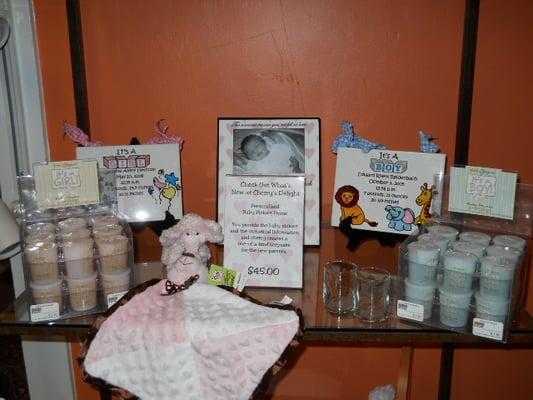 Personalized baby gifts, picture frames, birthing plaques on ceramic tile, we even have baby powder scented candles.