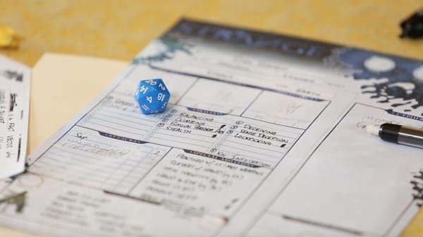 We play paper-and-pencil tabletop role-playing games. No screens, real people, real dialog, real storytelling.