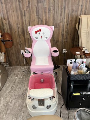 Adorable special pedicure chair for girls, between more traditional adult chairs with massage options