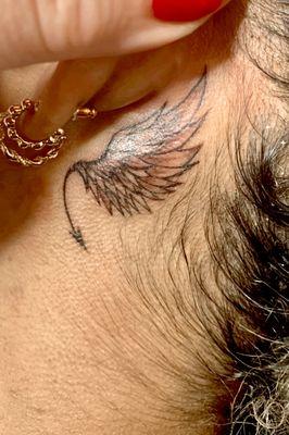 Angel/ Devil tattoo behind ear