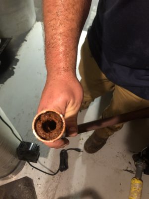 Pipe full of iron causing low water pressure.