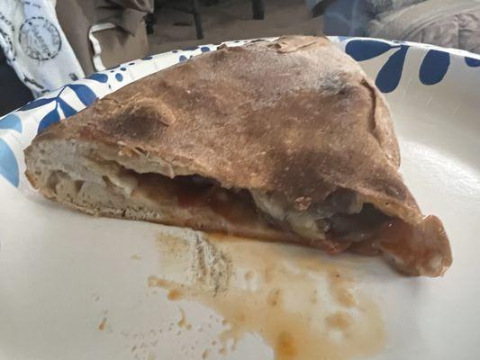 Pepperoni and Mushroom calzone with little to no filling in it! All bread!