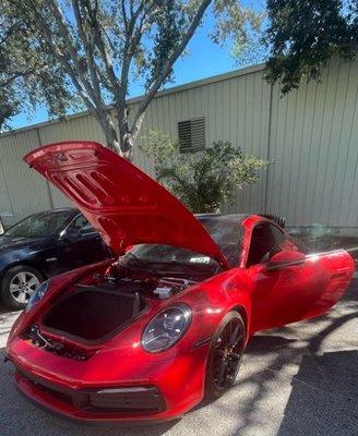 This is a 2022 Porsche 911 Carrera that was fully restored from Hurricane Ian locking the engine