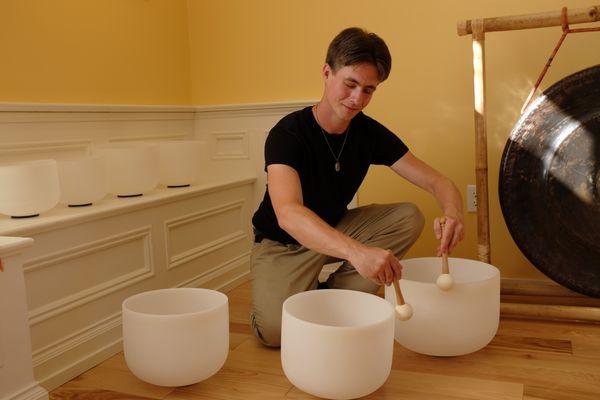 Sean playing the crystal bowls in our studio