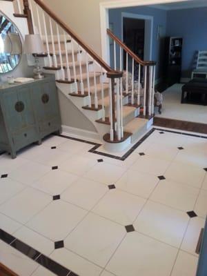 Marble floor installed in custom pattern chosen by customer.