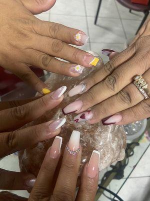 This is me and my girls nails we all got different designs. I love them.