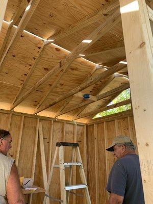 Storage building interior with truss built on site.