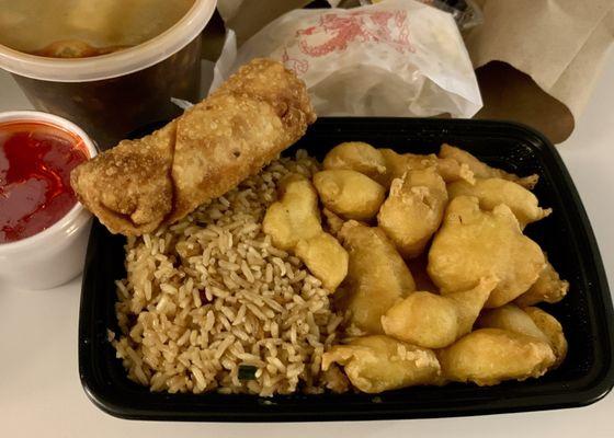 Sweet and Sour chicken combo with fried rice and an egg roll. Pretty good for carry out.