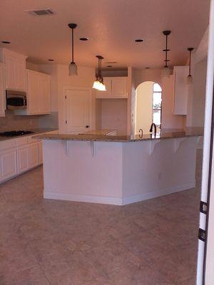 In with the new. These cabinets use to be beautiful knotty alder, now they are flawless white