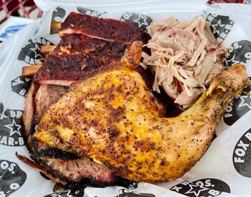 Ribs, pulled pork, chicken quarter, brisket. Famous sauces and sides not pictured.