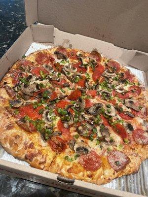 Large pizza with Pepperoni, mushroom, and green pepper and butter/Parmesan crust.