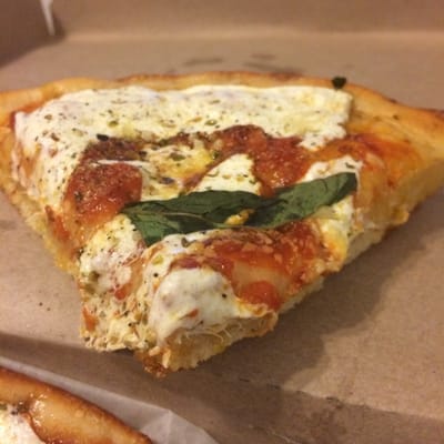 Margherita slice - it's pretty thick, about as thick as focaccia