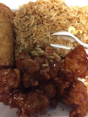 sesame chicken with fried rice & egg roll lunch combo. generous portion!