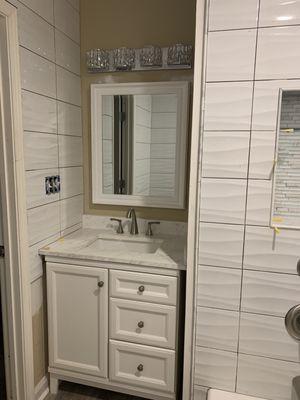 Spare room bathroom remodel with Blanco Wavy tiles