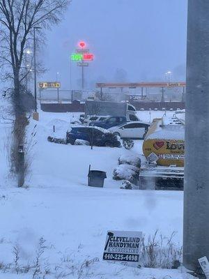 Blue car was towed from that corner spot and it was out of the way for plowing.