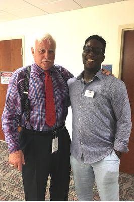 Attorney Kweku Darfoor and legendary hall of fame football coach Howard Schnellenberger at an FAU football game.