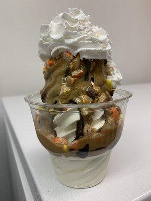 Our famous PB Delight Sundae! Hot fudge and Peanut Butter, French Vanilla Custard and Reese Pieces.