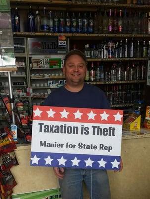 The owner, Daniel, partaking in some political shenanigans.