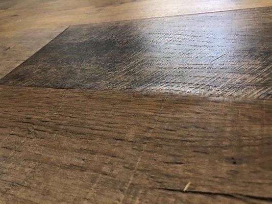 Laminate flooring melted and buckling.