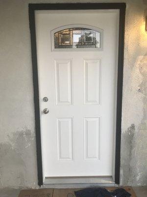 New installed door with stucco work