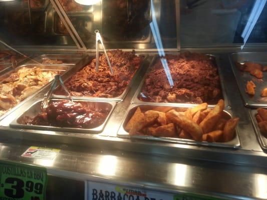 Beef barbacoa, carnitas, bbq ribs and steak fries.