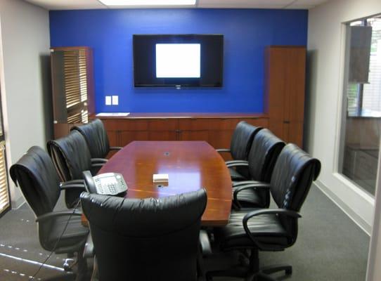 Conference room includes a large flat panel TV for training and webinar meetings