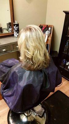 Partial highlights with heavy layers very fun hair style!