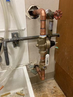 Water main valve and regulator replacement at a local bank