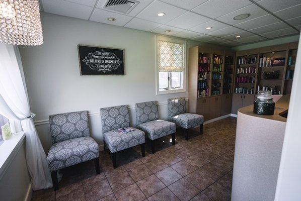 The reception area is comfortable and inviting. Relax as you anticipate your next great hairstyle!