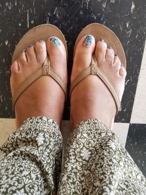 Pedicure with free hand multiple colors