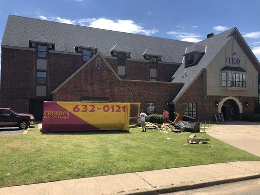 Oklahoma University in Norman fraternity end of school cleanup.