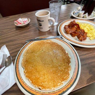 Light and fluffy buttermilk pancakes with bacon and scrambled eggs at the Farmer's Daughter Cafe!