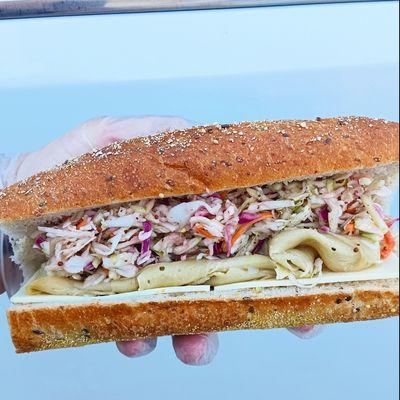 The Rachel kind of like a Ruben but with turkey, tangy coleslaw, swiss and Dijon.