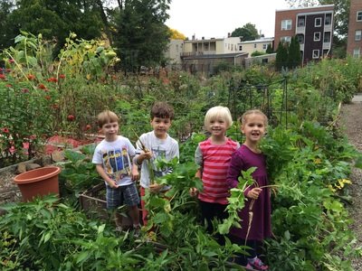 Neighborhood House Kids Enjoy Their Garden Harvest!!