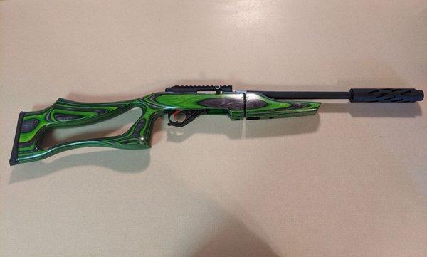 Ruger 10/22 takedown, boyds stock. Zombie green, kidd 2 stage 2lb trigger (a must) don't pay for engraving! Total waste of money!