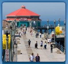 Huntington Beach Pier with large Ruby's Diner at the end which overlooks Catalina Island.