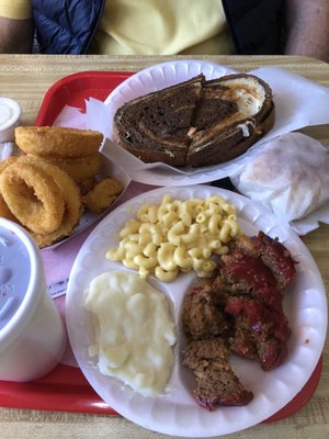 Meatloaf with potatoes and Mac cheese. Ruben with onion rings.