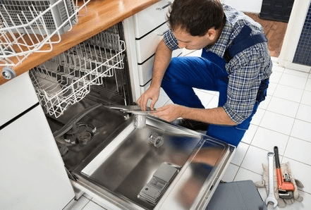 Local Appliance Repair Expert fixing a dishwasher.