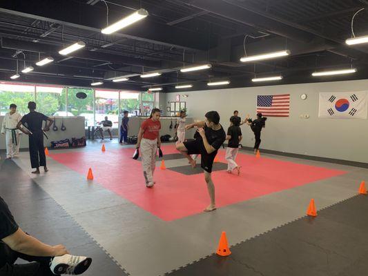 Relays of kicking techniques in our 2 hour high performance training on Saturdays.