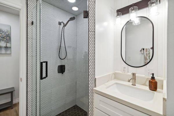 This is a beautifully remodeled bathroom next to the two queen size bedroom.