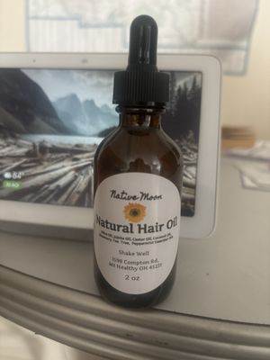 This is the 2 ounce bottle of natural hair oil. The owner recommend that I use on my scalp.