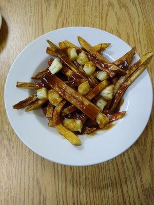 Poutine Fresh cut fries cheese curds with brown gravy