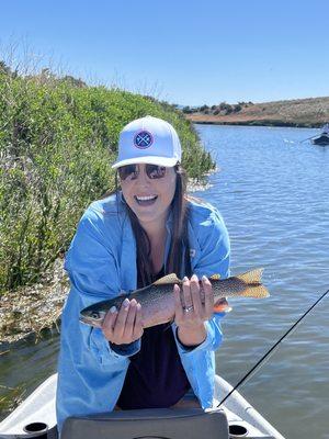 My wife getting her first fish