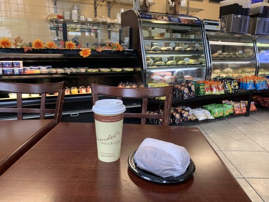 This is a perfectly toasted and buttered egg everything bagel and chocolate raspberry coffee.