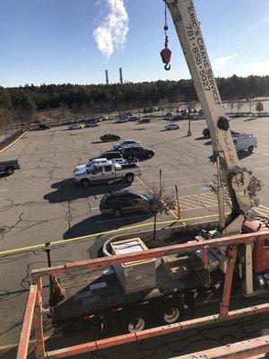 Hoisting roof top units